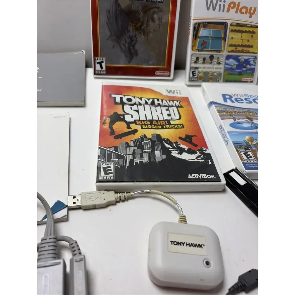 Nintendo Wii 25th Anniversary Red Console Bundle, 3 Remotes, 4 Games ,2 Nunchuk